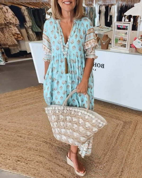 MANA | CHIQUE BLOEMEN MIDI-JURK MET V-HALS