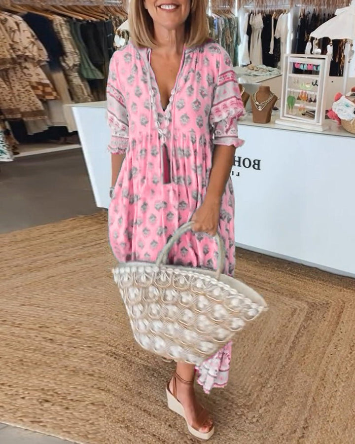 MANA | CHIQUE BLOEMEN MIDI-JURK MET V-HALS