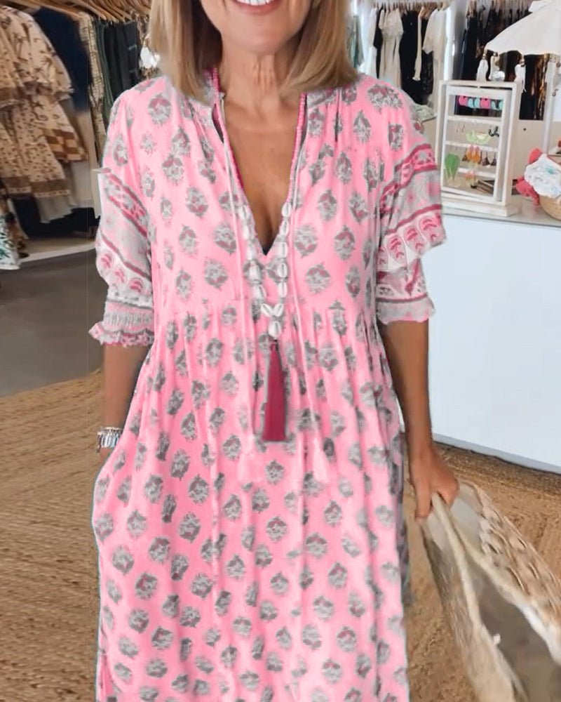 MANA | CHIQUE BLOEMEN MIDI-JURK MET V-HALS